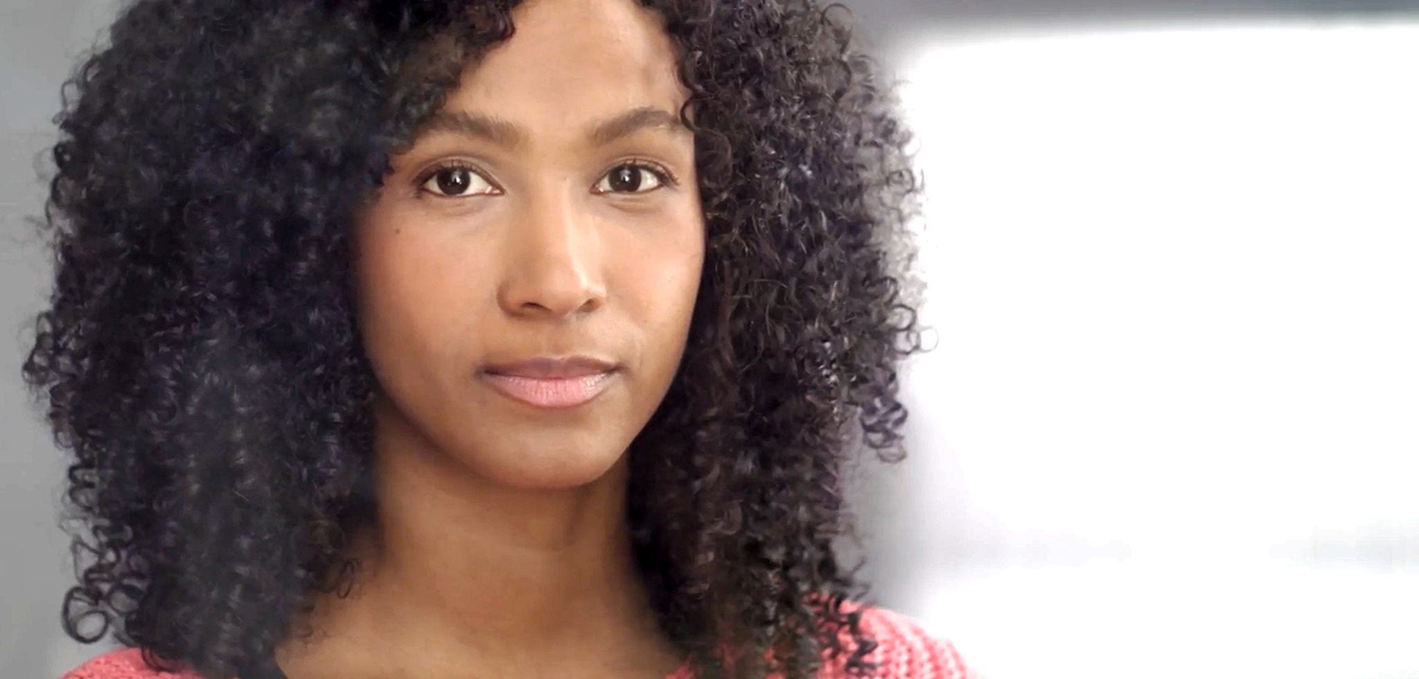 A healthcare professional with a warm smile.