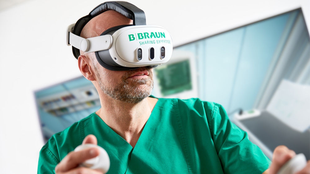 Male nurse wearing VR glasses