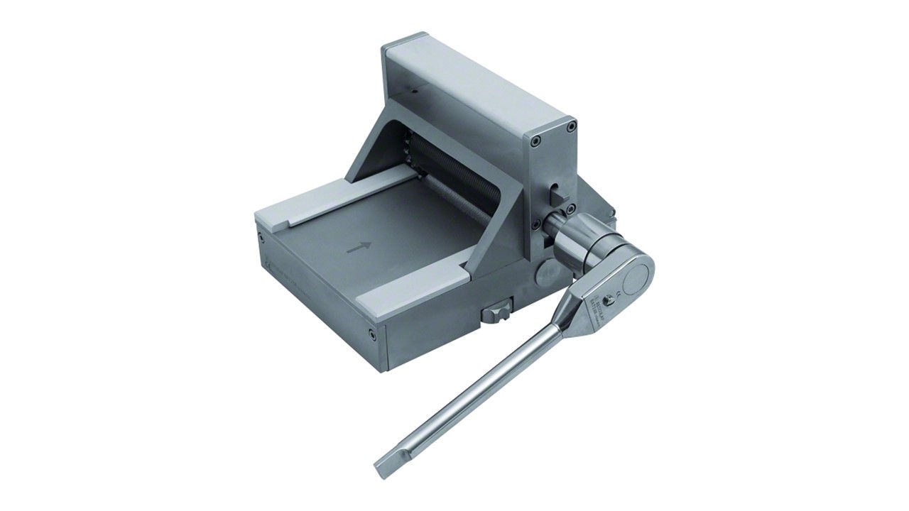 Acculan 4 surgical power system held by one hand with glove