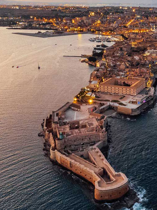 A panoramic view of the city of Saint-Laurent, France, showcasing its charming architecture and vibrant urban landscape.